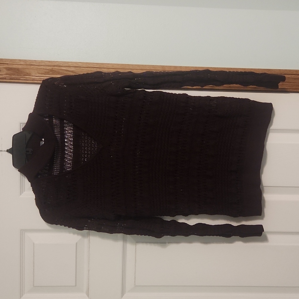 Womens sweater, maroon in color. Size medium